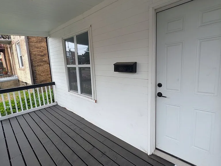 7526 Dickson St — Photo 2