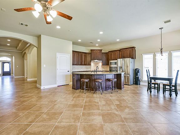 Another view of the spacious living room shows the open floor concept.