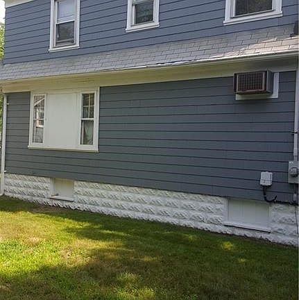 View of the house and private yard to the side of the house.