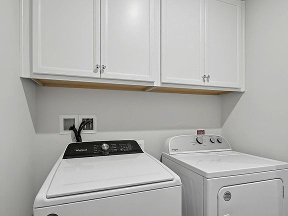 Laundry Room with Full Size Washer and Dryer