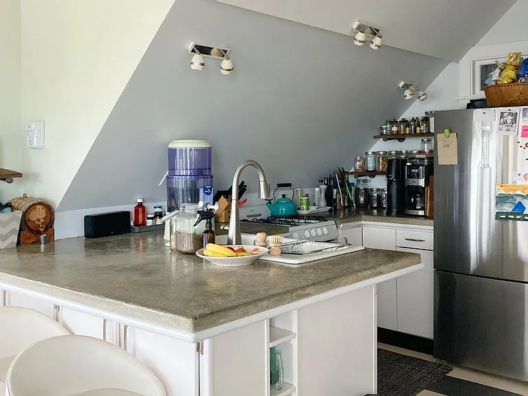 Open kitchen, custom concrete counter tops.