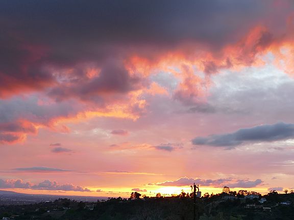 A dramatic sunset seen from the property.