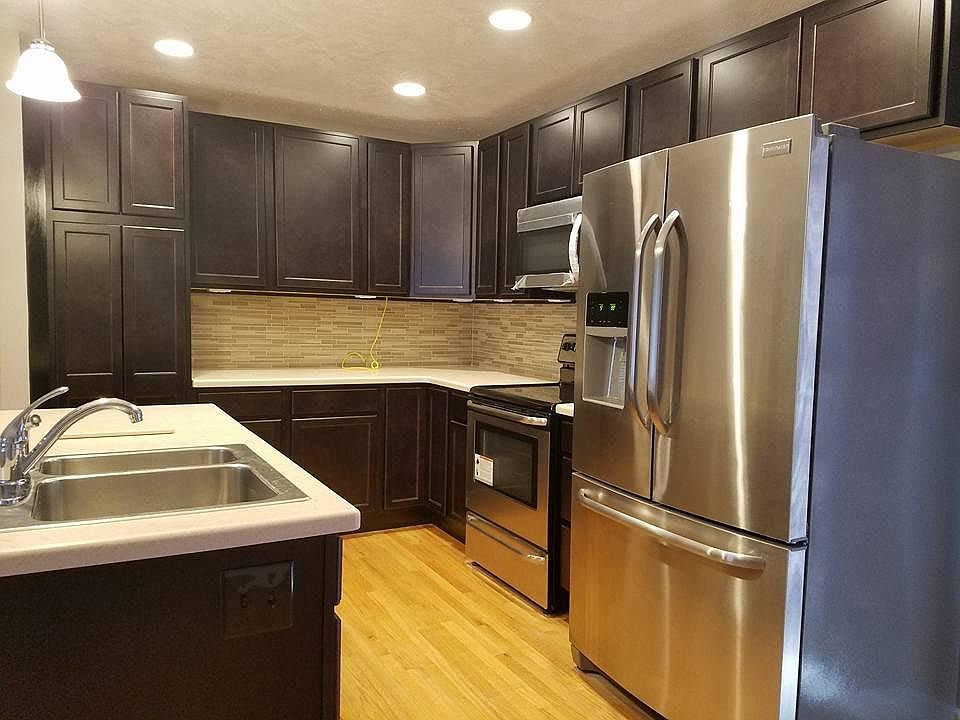 Renovated kitchen with stainless steel appliances