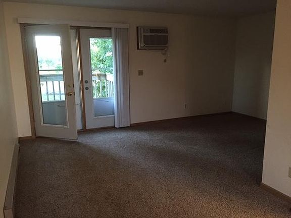 Main entry door and living room.