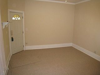 Main Living Area. Entrance to unit at left in photo. Bathroo