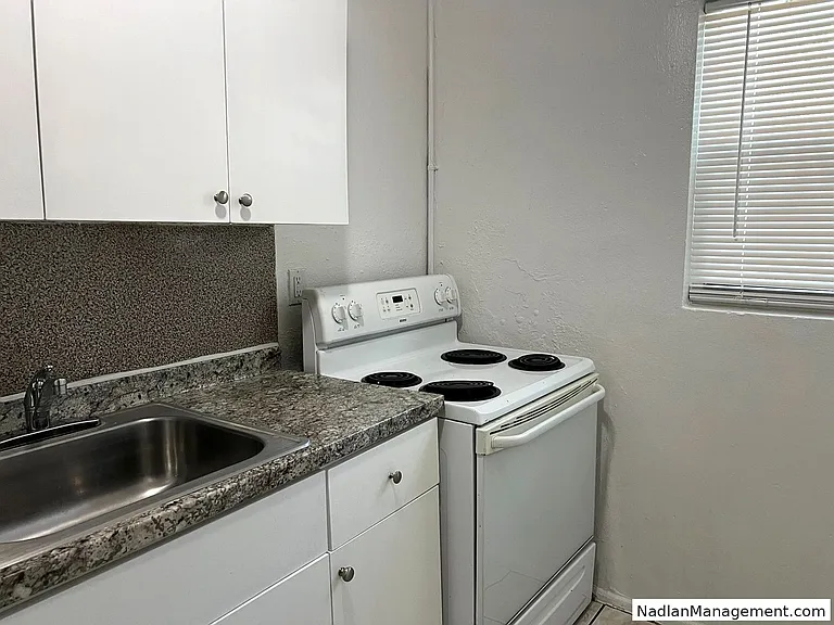 1948 NW 2nd Ct — Photo 1