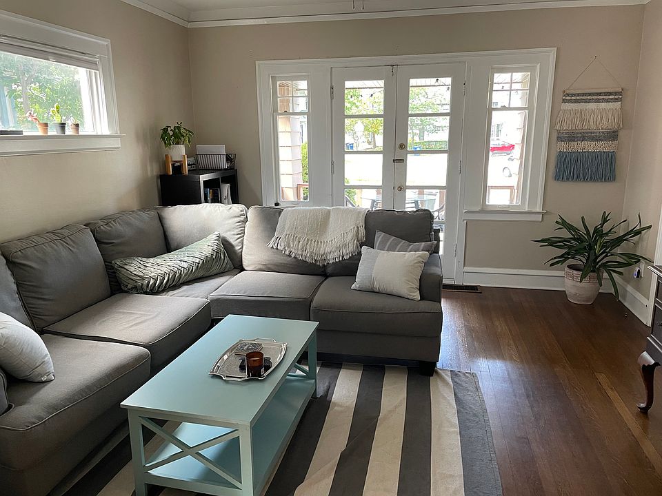 Bright living area. French doors open to large front porch.