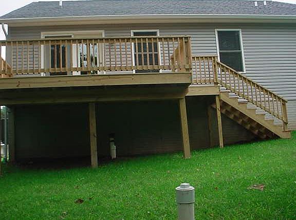 Rear of home with deck