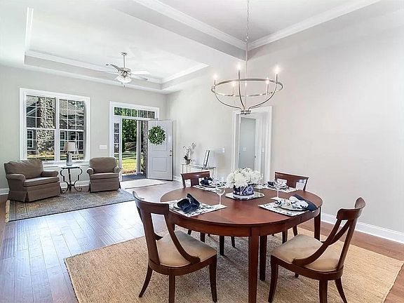 Looking from Dining to Front door and Living Space