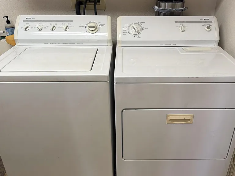 Convenient laundry area with a full-size washer and dryer setup to keep everyday chores simple and efficient.