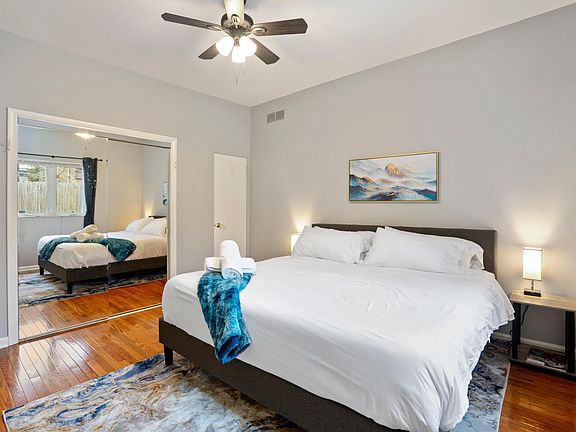 We've thought of every detail in our 1st-floor bedroom for your comfort. A ceiling fan for added breeze, a white noise machine for peaceful nights, and blackout curtains to ensure you get a restful sleep. Your well-being is our priority during your stay!