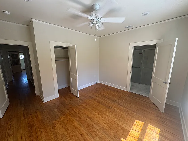 View from backyard windows showing private closet and door to hallway of the home