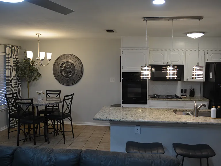 Full kitchen - fully stocked kitchen with appliances and cooking essentials.