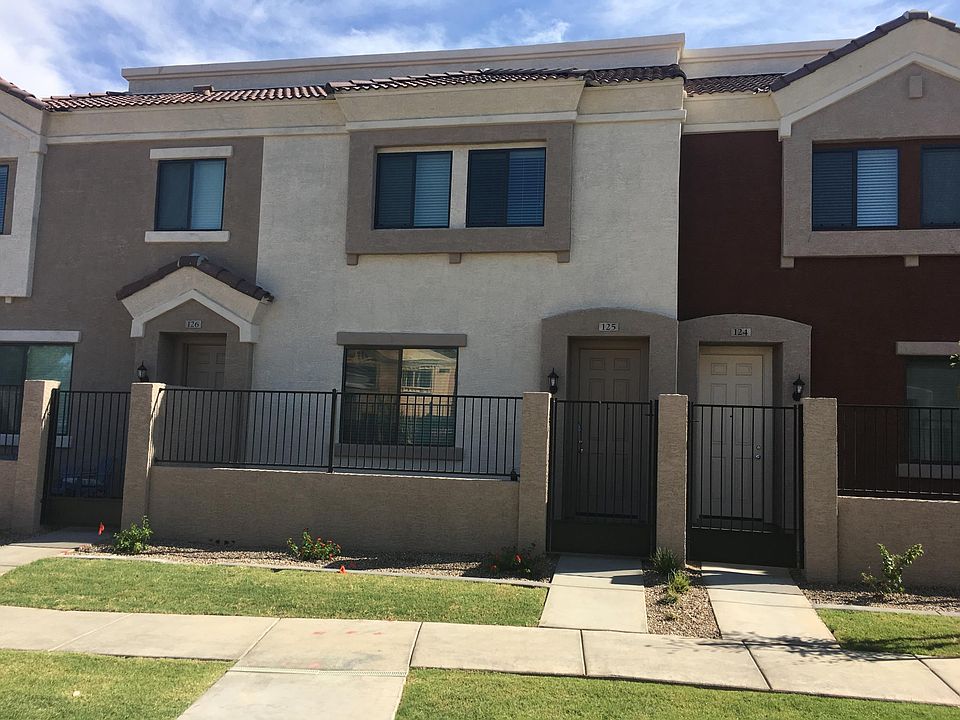 Front gated courtyard opens to common walk area. Community pool located nearby.