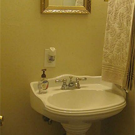 Downstairs bathroom has full size bathtub
