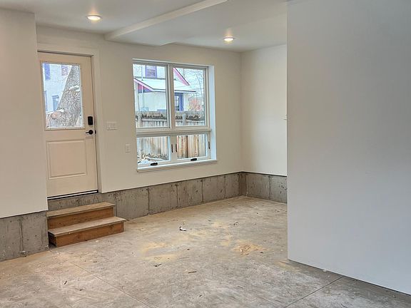 lower level garage or shop space. lots of light. fully heated.