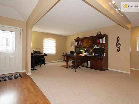 Roomy Living Room Open to Front Entry.  Perfect for an Office, Reading Area, &/or a Piano!