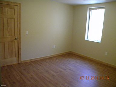 bedroom 1 with lots of natural light