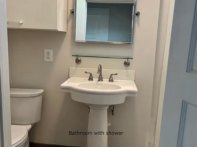 Bathroom, tile floor, new toilet, shower