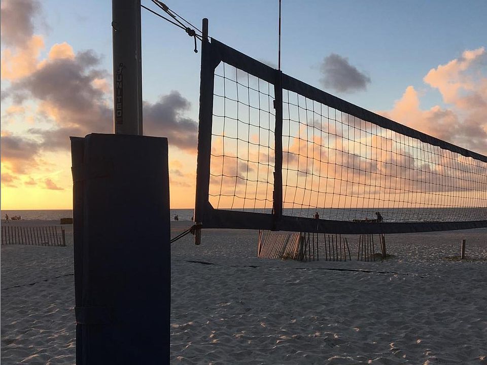 Sunrise across the street from the Caligny Beach volleyball courts.