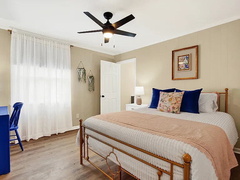 Master bedroom with flat screen tv. Master bath & shower