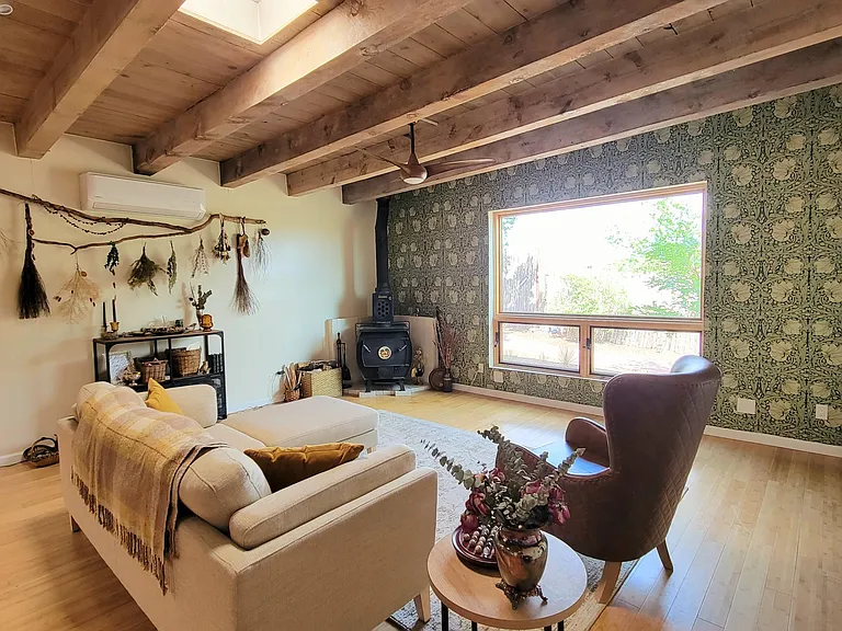 Living area with eastern view of Sangre de Cristo's