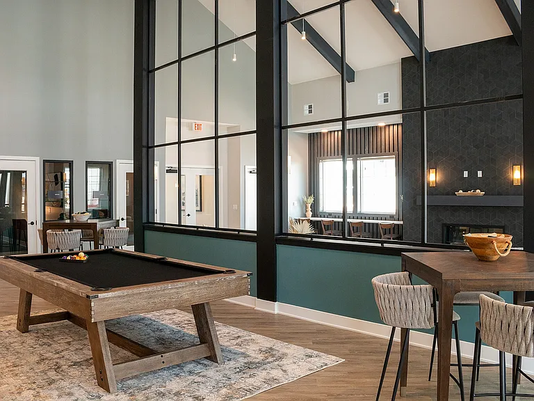 The clubhouse is a community space for residents to relax, play games, shoot pool, or work.