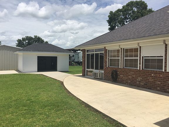 Side with storage shed