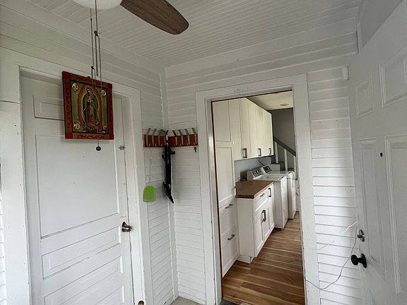hang your coat and enter the large bright kitchen