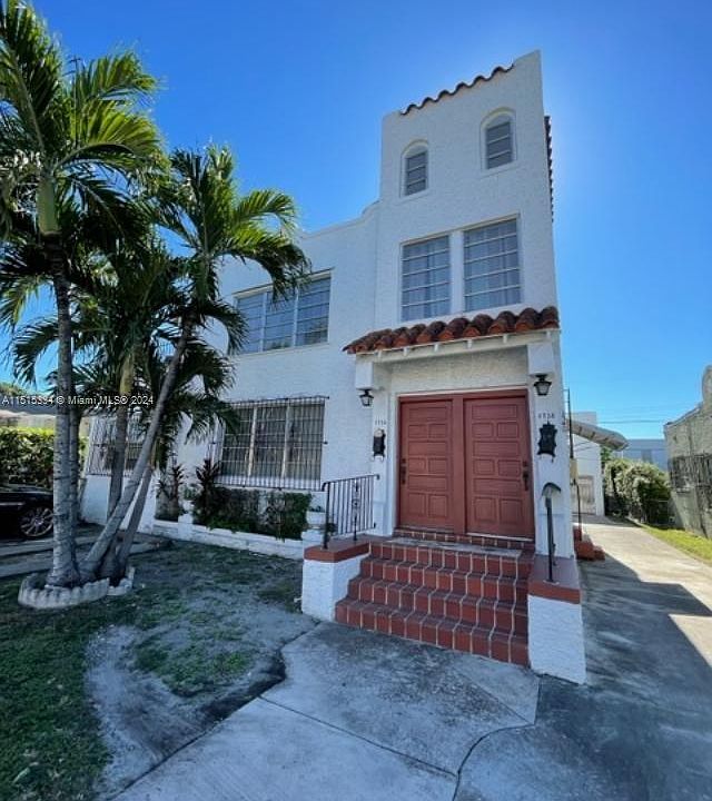 Old Spanish fourplex