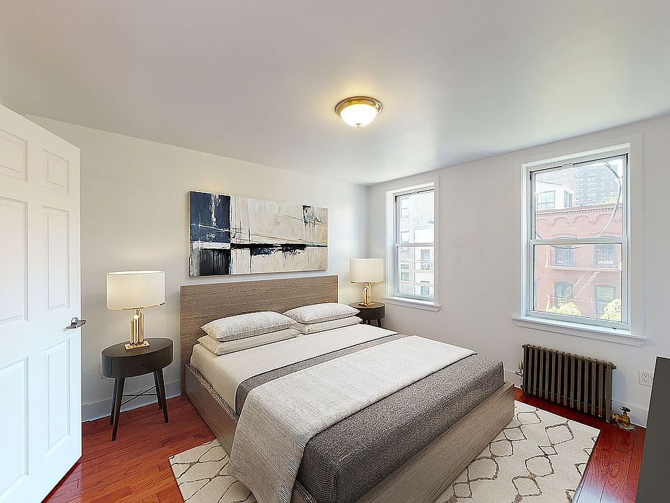 1st image of 125 E 7th St APT 3E