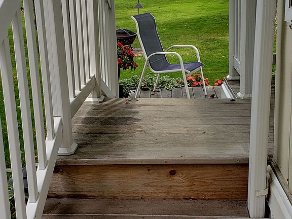 Stairs to door and lake side