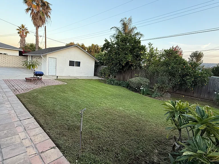 BACKYARD IS PERFECT FOR PETS FRIENDLY AS IS ALL BLOCK WALLS AND FENCED