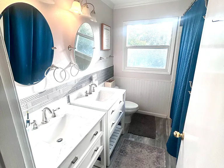 Upstairs hall bath, also has storage closet