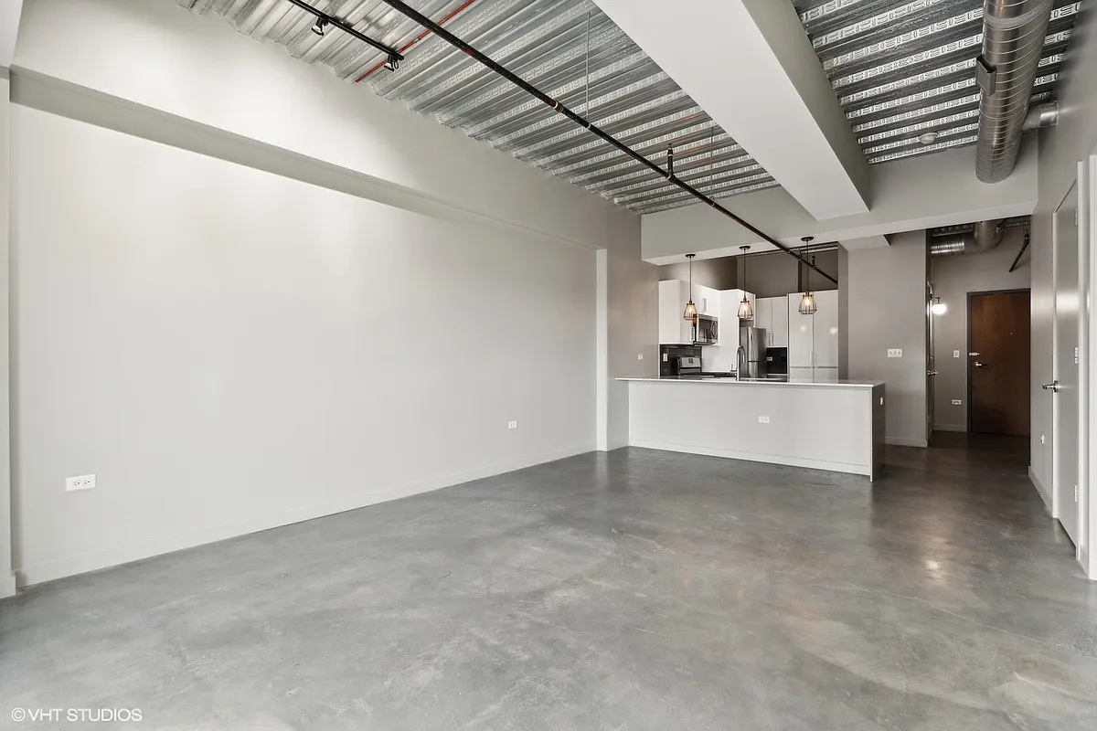 Building Photo - 1245 N Milwaukee Ave #703