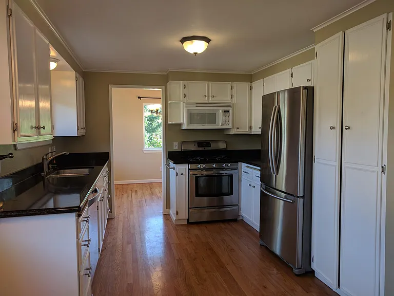 Full view of kitchen from breakfast nook