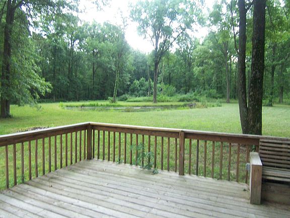 Deck overlooking pond and woods