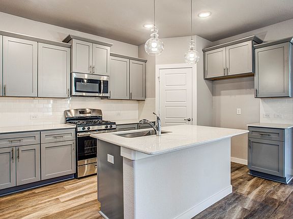 Stylish kitchen with corner pantry