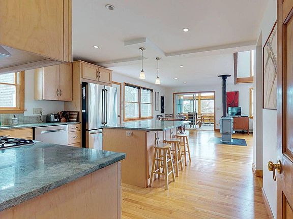 Newly remodeled kitchen with Dining space in background