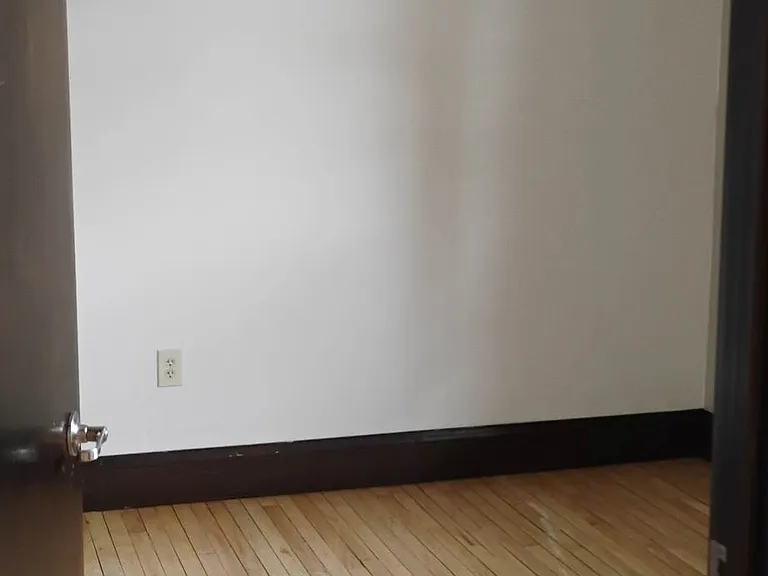 Hardwood floors in bedroom