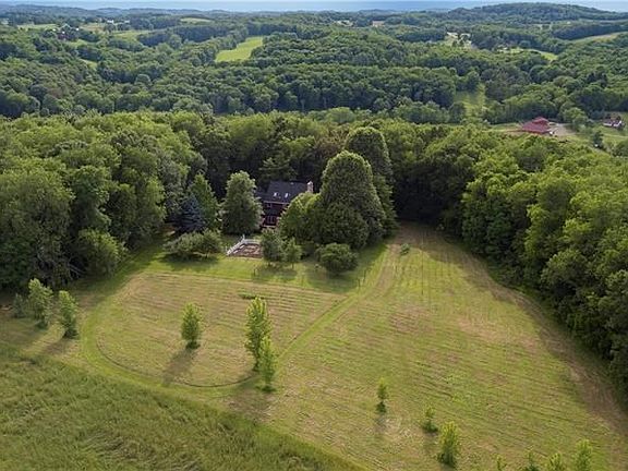Total privacy on this 14 acres.  The apparent 'property line' shown here in the foreground is at the top of a gentle hill, so al