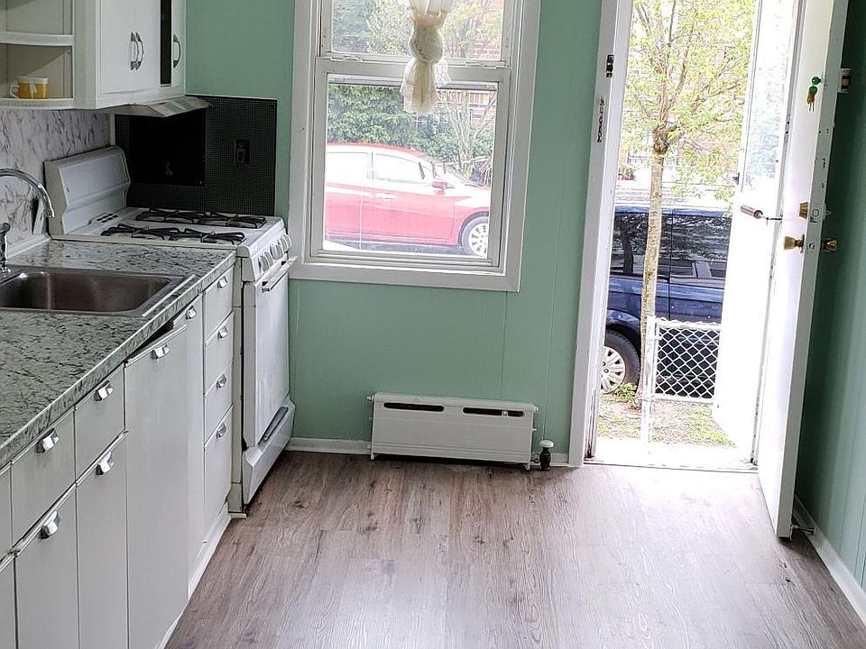 Willing to update kitchen cabinets, stove, refrigerator, microwave