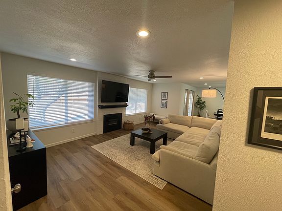Open family room with electric fireplace