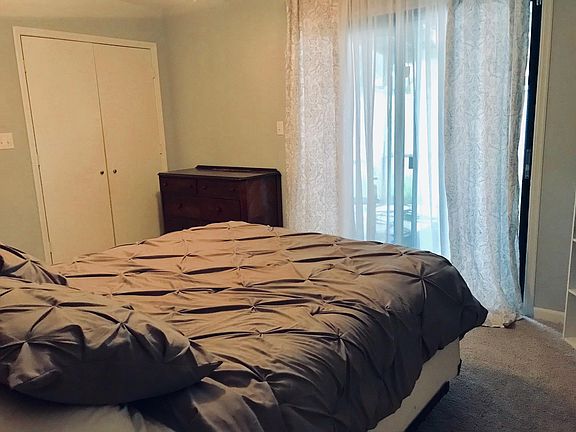 Master bedroom with two closets and master bath