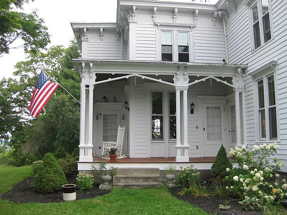 Multiple entertaining spaces : Huge Bluestone patio for entertaining and quiet porch for relaxing