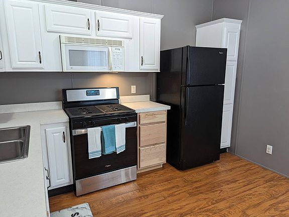 L Kitchen cabinets wood cabinets were just replaced and will be painted to match