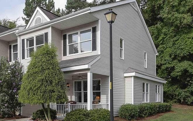 End Unit with large green area and front porch