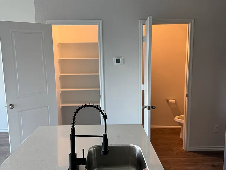 Kitchen Island
Kitchen Pantry
Downstairs Half Bath