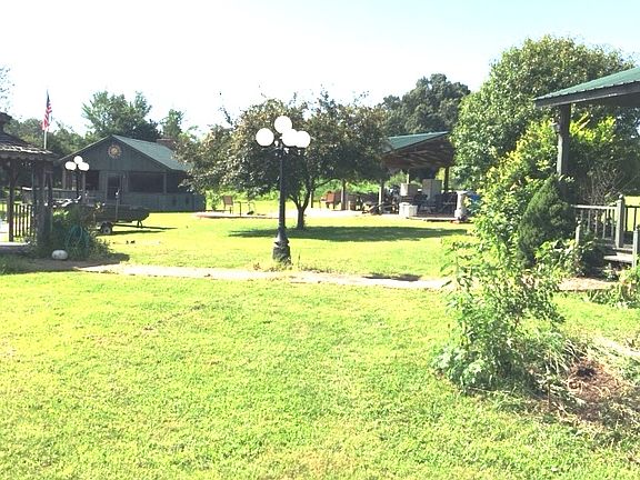 all bldgs. by stocked pond