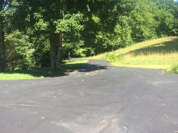 FRONT DRIVE & EXTRA PARKING